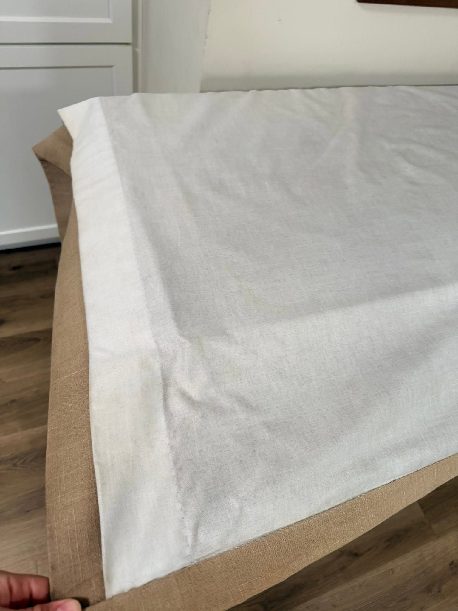 A lined drapery panel after cleaning, bright and even